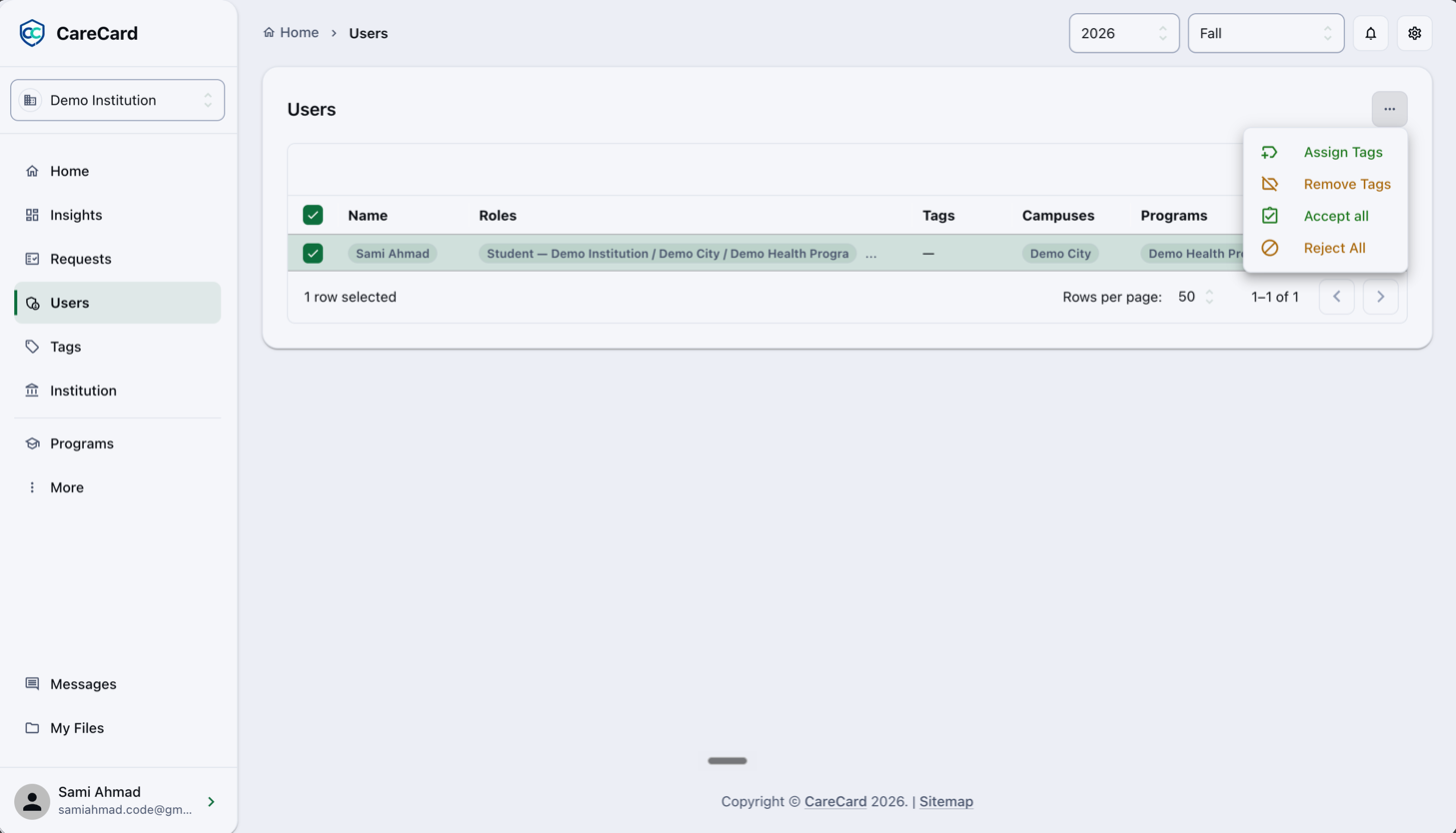 Users page with a student selected and the Action menu open, showing Assign Tags and Remove Tags